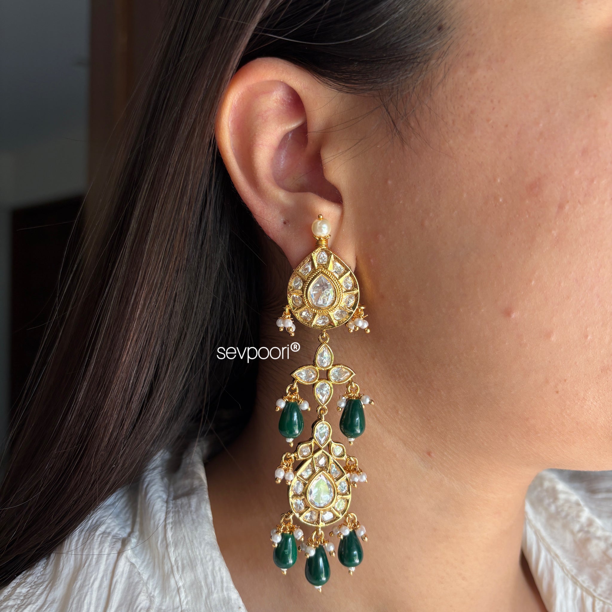Green polki kundan long earrings
