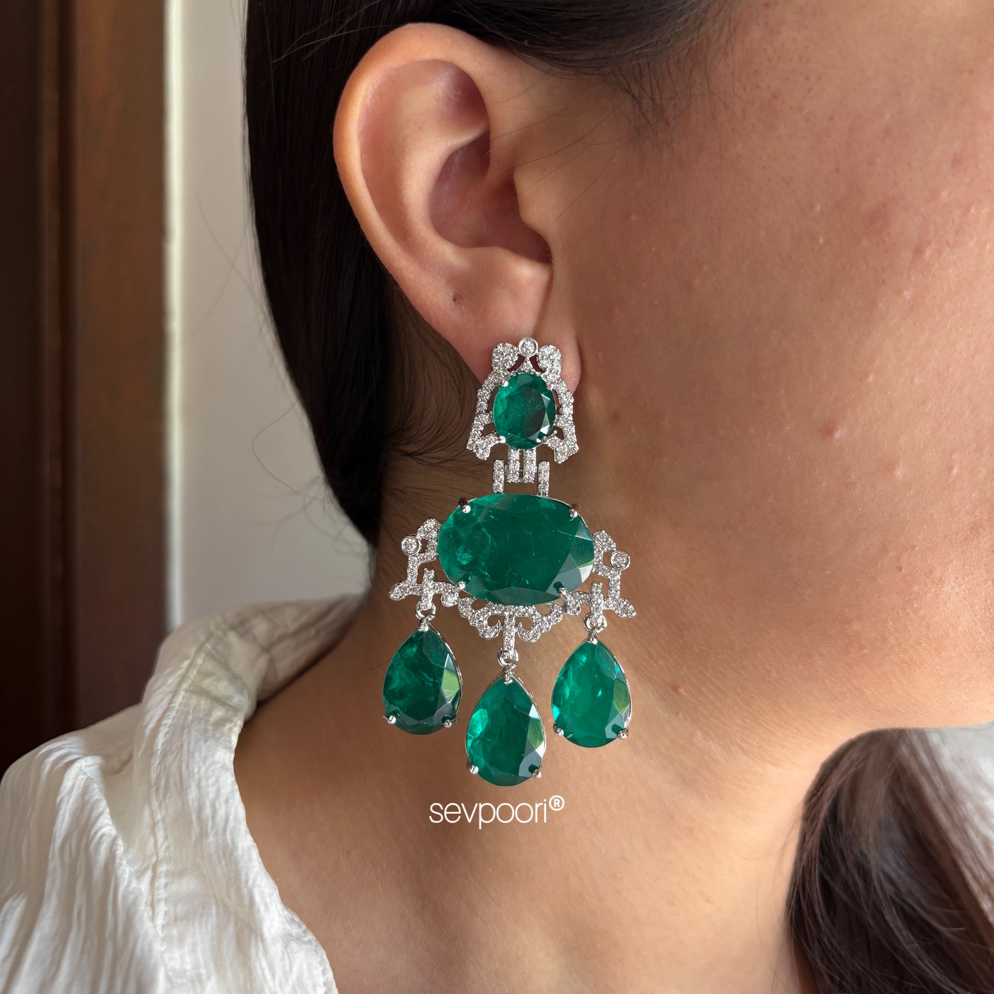 Emerald stone statement earrings