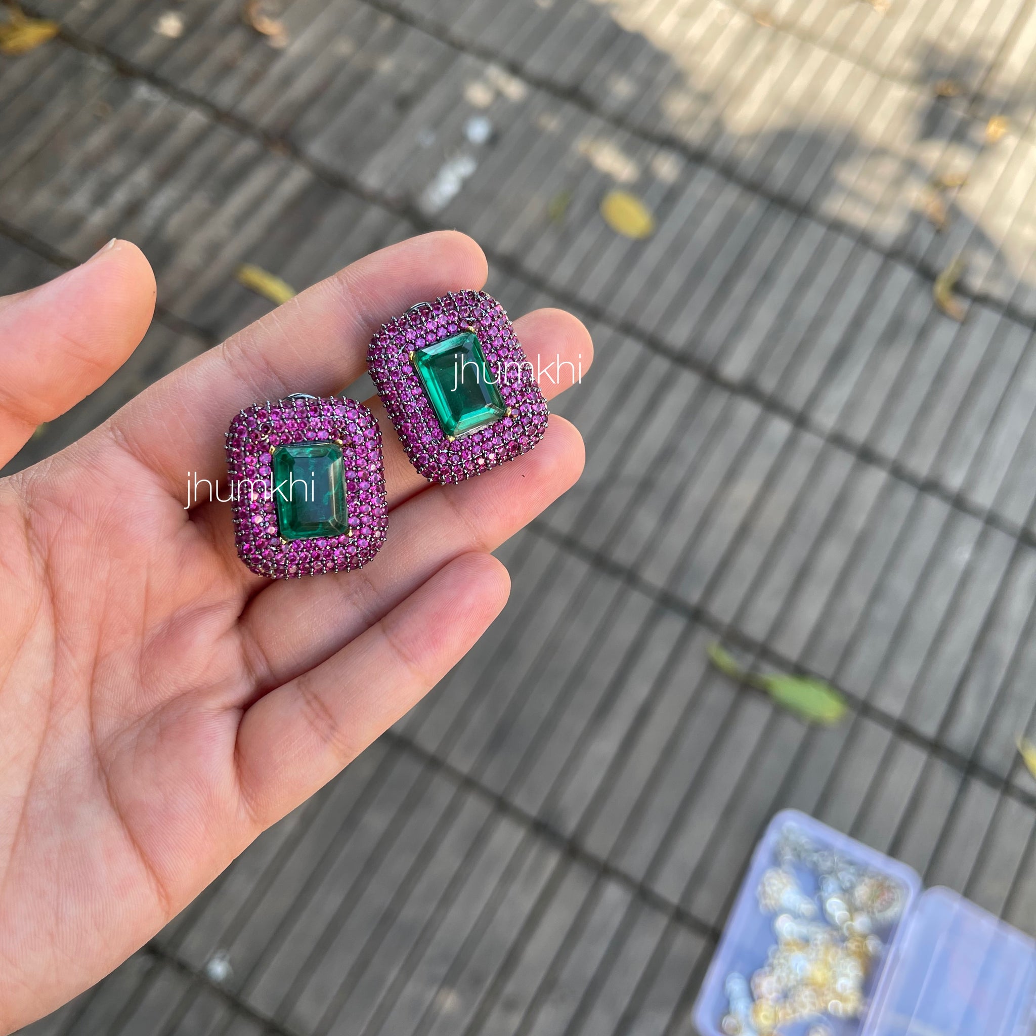 AD purple stud earrings