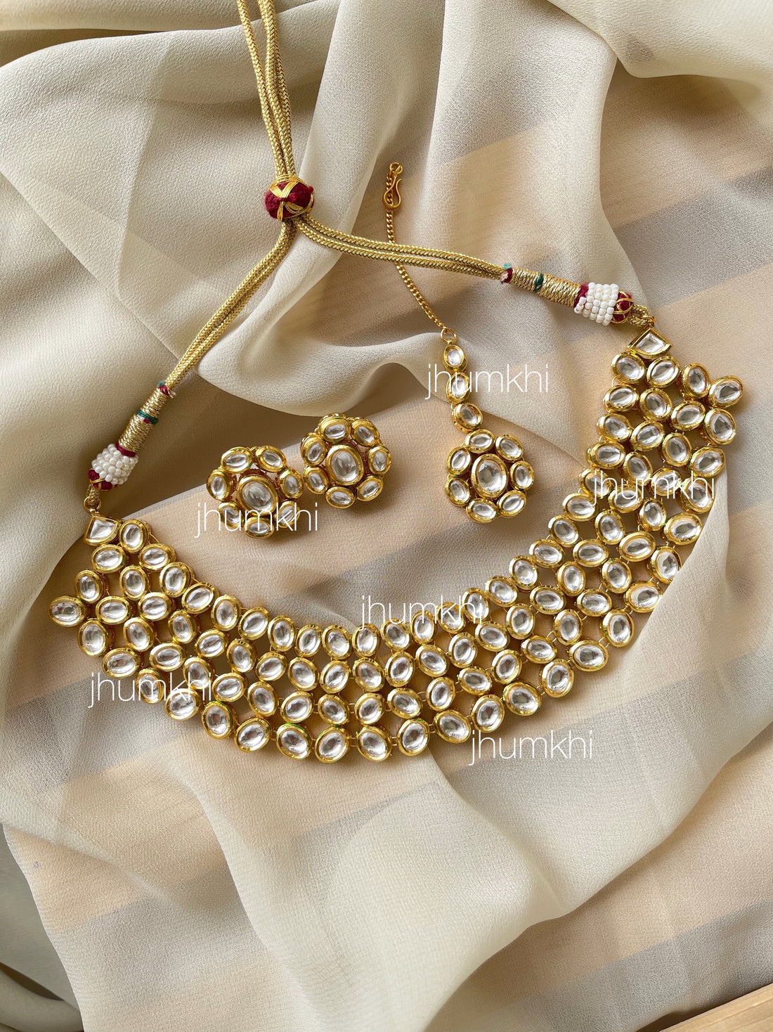 Four lines kundan jewellery set with tika