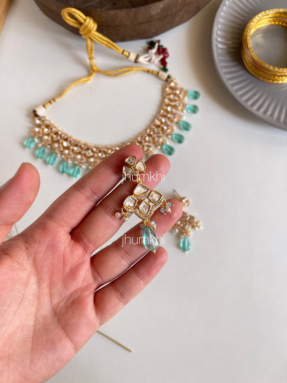 Elegant polki kundan set in aqua blue