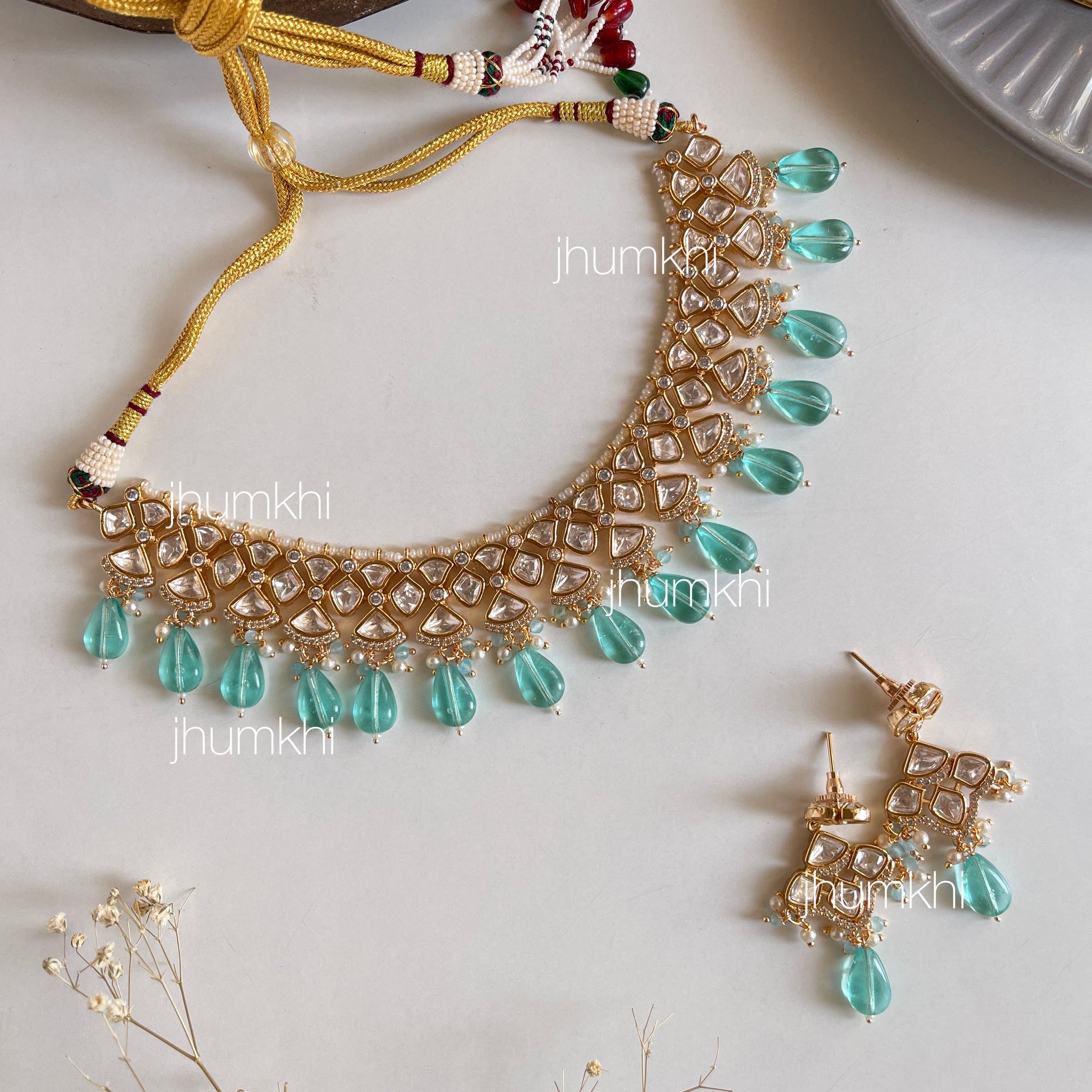 Elegant polki kundan set in aqua blue
